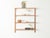 A classic wall shelf from the 1960s. The high-quality shelves are veneered in teak. The system consists of four shelves...