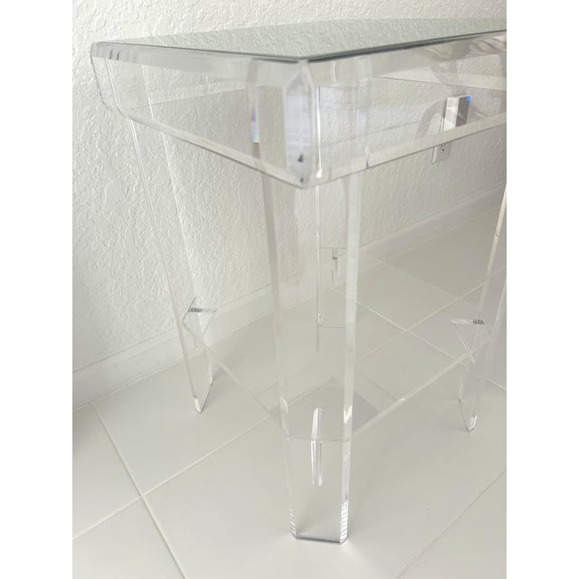 Stylish mid-century square Lucite framed table with mirrored glass tabletop insert and bottom Lucite shelf. Lucite frame...
