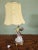 An adorable Victorian table lamp that will delight vintage lovers. Hand-painted porcelain with cute details such as a...