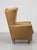 The Space Age Gold Wingback Chair by Larry Laslo for Directional is a luxurious accent chair perfect for adult spaces....