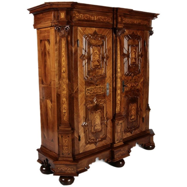 Age and Origin: The cabinet likely dates from around 1750 and is probably from Vienna, Austria. Dimensions: Height approx....