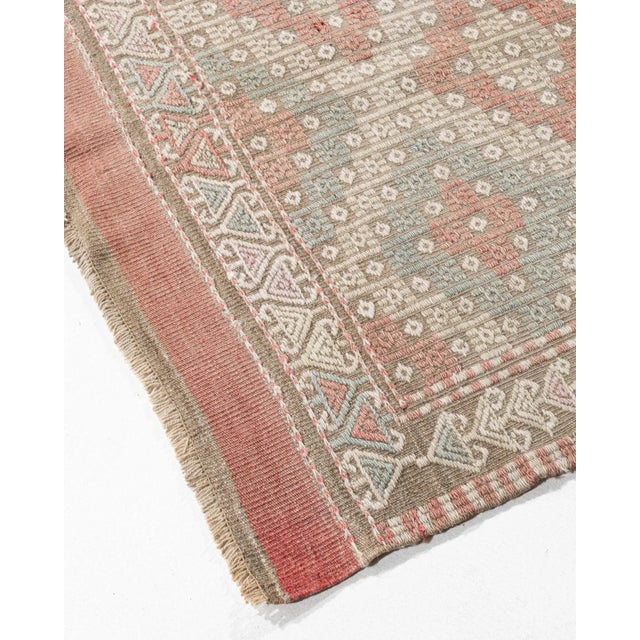 The Jajim (cecim) technique, practiced in Turkey, Persia, and the Caucasus, involves a plain weave ground with an...