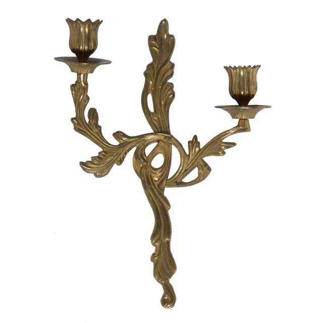 Pair of stylized acanthus leaf cast brass wall sconces. Made in the Mid 20th Century.