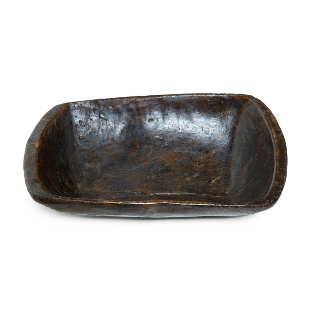 This large wooden farm tray from perfectly balances rustic texture with minimalist simplicity. Carved from a solid block...