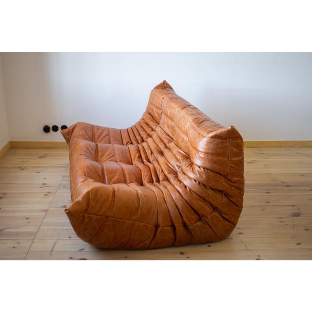 This Togo has been reupholstered with new foam and high-quality new fabric, keeping its inner structure giving the item...