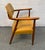 Add a striking accent to your interior with this authentic Mid-Century Modern armchair. Featuring iconic sculptural lines...