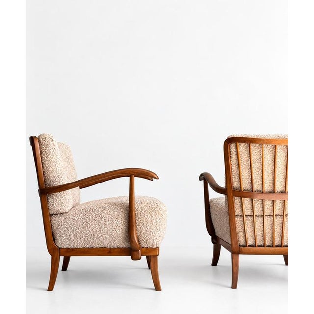 A pair of armchairs designed by Gyula Kaesz in the 1930s. The wooden frames have been carefully restored, and the cushions...