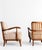 A pair of armchairs designed by Gyula Kaesz in the 1930s. The wooden frames have been carefully restored, and the cushions...