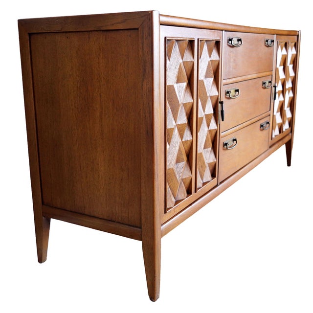 Iconic mid-century modern buffet from Broyhill’s highly collectible Brasilia line, featuring the distinctive “Diamond...