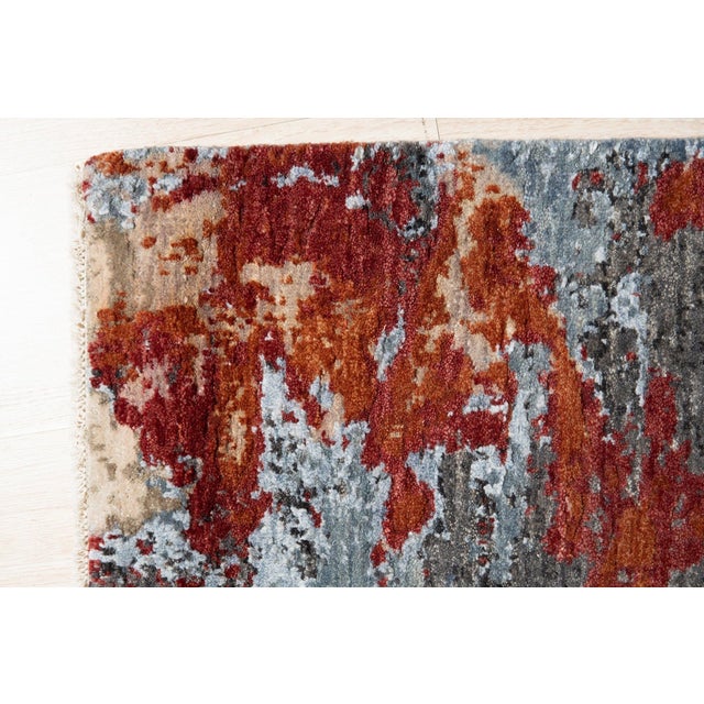 Hand-knotted in wool, this 8 x 10 Kira Sophie rug carpet is a refined addition to our contemporary room-size rug...