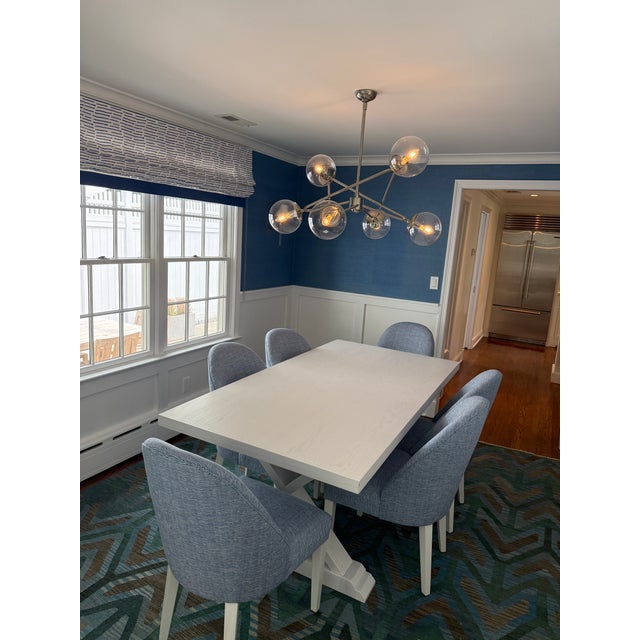 A beautifully coordinated lighting set removed from a professionally designed Fairfield County dining room. Sold together...