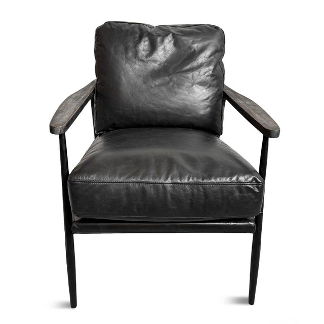Handsome dark charcoal black top grain leather club chair. Grey-brown wood armrests and hand hammered iron frame. Each...