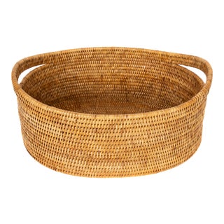 Artifacts Rattan Oval Basket With Cutout Handles in Honey Brown For Sale