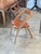 Zama dining table and eight Lambda chairs by Berkeley Mills, 2006. Solid cherry. The tabletop has a curly maple center...