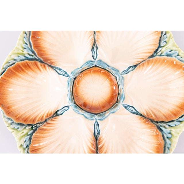 A gorgeous antique French Sarreguemines majolica oyster plate, circa 1870. Maker's mark and model number on reverse (this...
