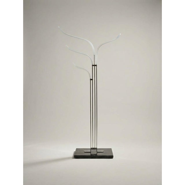 This object is a vintage mid-century modern freestanding coat rack (or hall tree) from the 1970s, highly characteristic of...