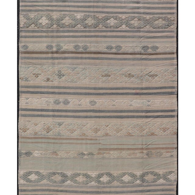 Measures: 5'7 x 12'3 Vintage Turkish Gallery Kilim with Soft Blue-Gray and Sand Striped Motifs. Keivan Woven Arts /...