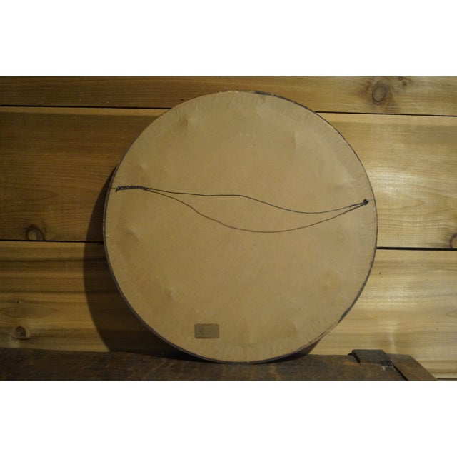 A vintage needlepoint fiber art which is custom framed in a gold tone frame. This is an estate sale find and is in very...