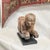 Wooden Carving of a Baby Buddha on Formica Base. Our piece invites a sense of mindfulness and beauty to bring into your...