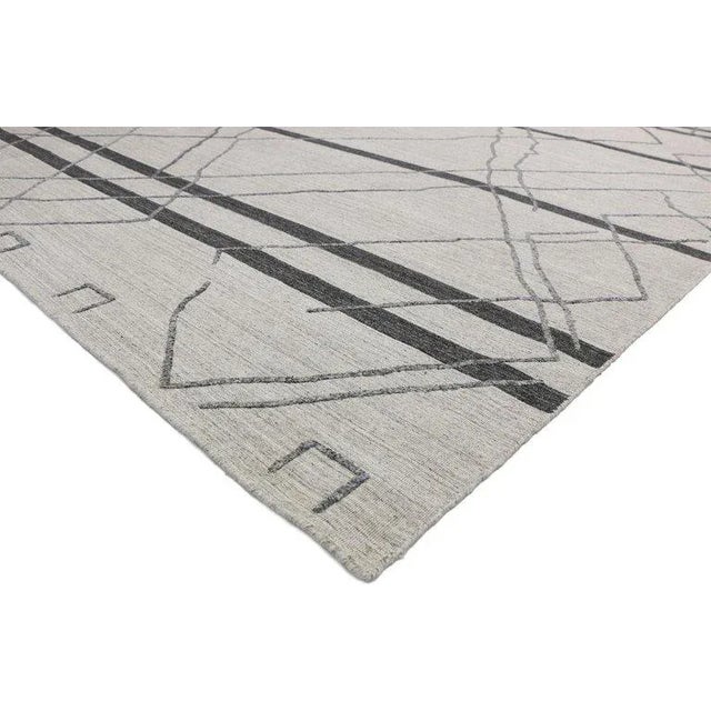 Warm hygge vibes meet tribal designs in this contemporary Moroccan style gray rug. A dynamic fusion of contemporary trends...