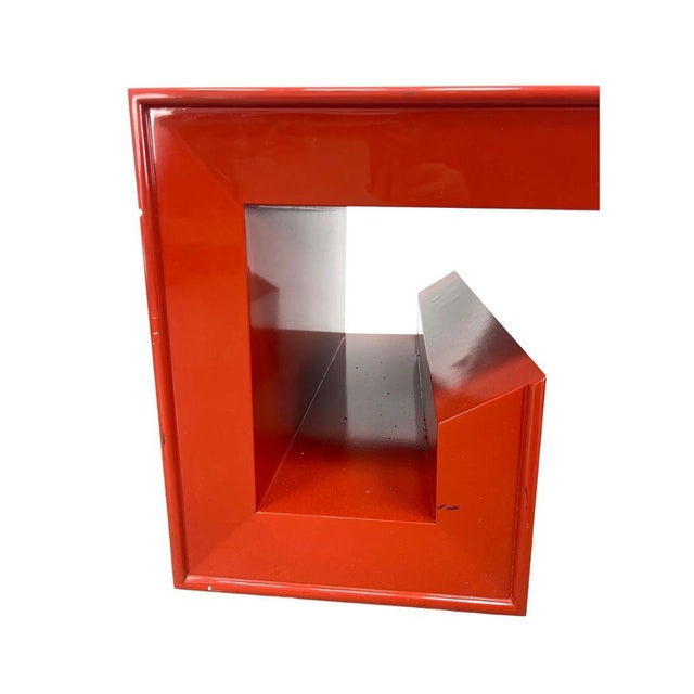 A James Mont style coffee table finished in high gloss red lacquer embodies bold glamour with a distinctive Asian inspired...
