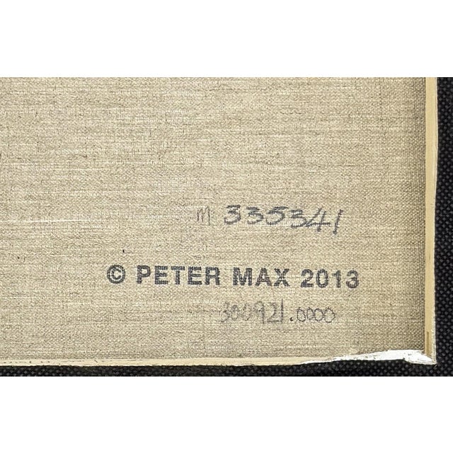 Original acrylic painting on canvas. Hand signed lower left by Peter Max. Canvas size: 10 x 10 inches. Frame size: 19.37 x...