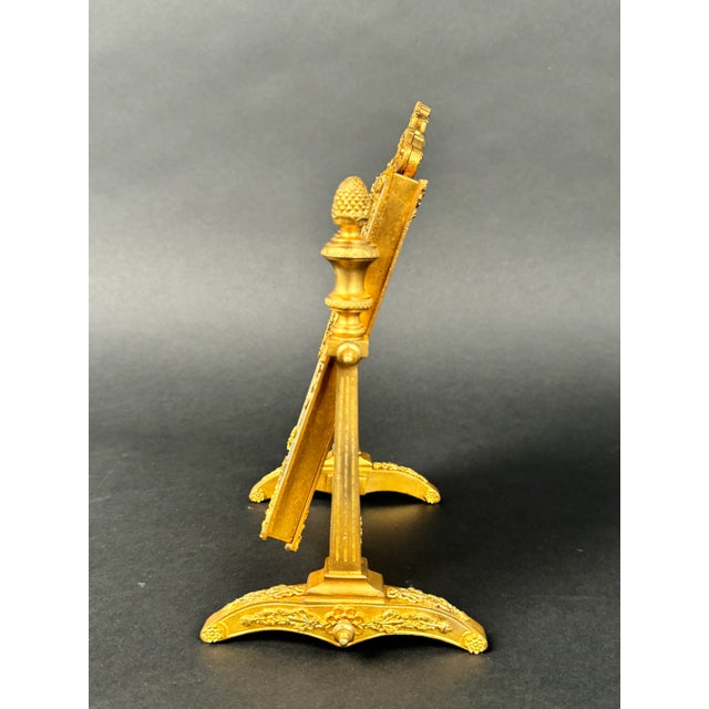 An antique French portrait miniature and mirror depicting a fine lady from the 19th Century. The portrait is a hand-...