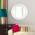 Bergman features a round frame characterized by a textured ribbed frame. It is then painted with our custom glossy white...