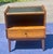 Elevate your bedroom aesthetic with this exceptional, authentic pair of mid-century modern walnut nightstands manufactured...
