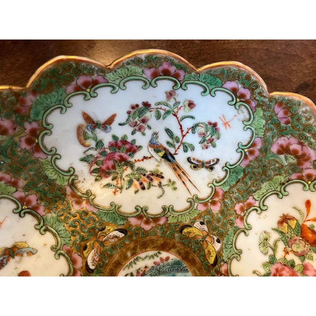 Antique 19th century Chinese Rose Canton porcelain round serving dish or low bowl. Decorated with panels of bird and...