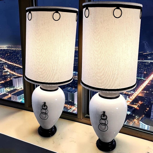 What a pleasure it is to offer such a sophisticated and charming pair of monumental ginger jar shaped table lamps. The...