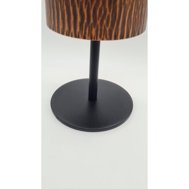 A brutalist wall vase from the 1960s, signed Wall Metalwork, made of copper with a distinctive warm brown hue and covered...