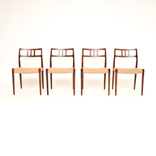 An incredibly stylish and iconic set of four Danish vintage model 79 chairs by Niels Moller. They were originally designed...