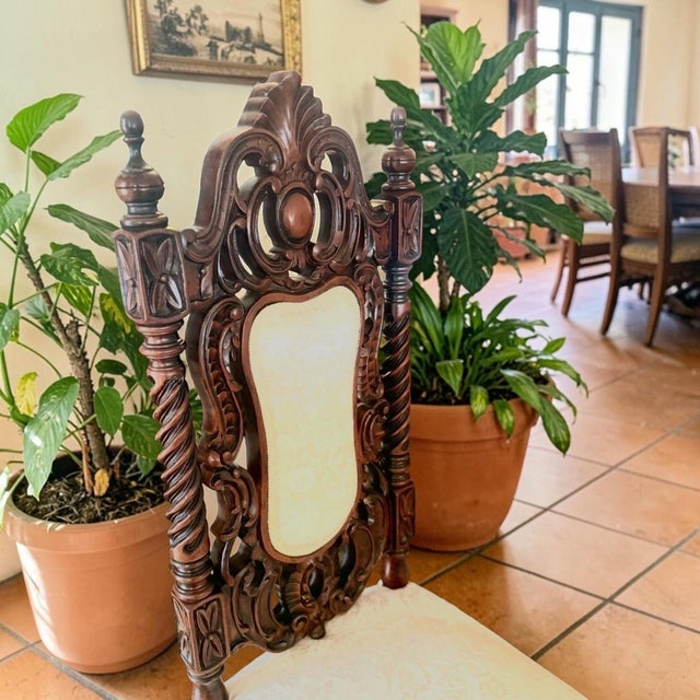 A striking 1970s French Renaissance Revival dining set that brings true old-world craftsmanship into a modern space. Rich...