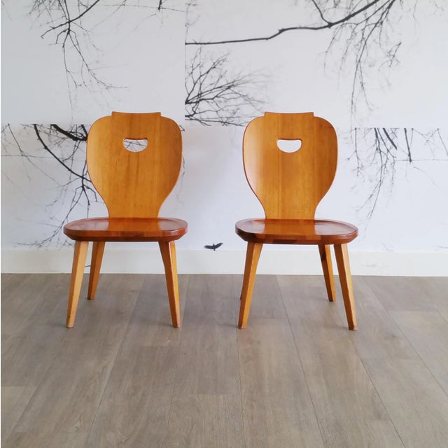 These chairs were designed in 1953 by the Swedish designer Carl Malmsten for Svensk Fur. This piece has an attribution...