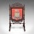This is an antique armorial embroidered panel screen. An Irish, walnut and needlepoint house insignia firescreen, dating...