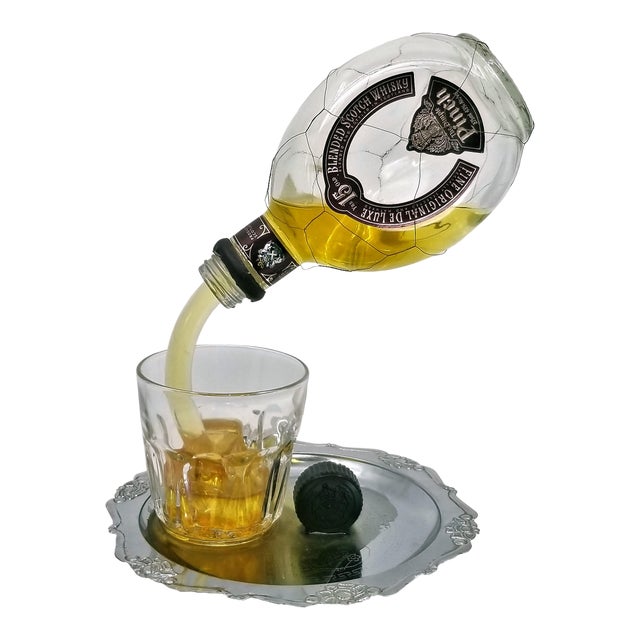 Pop Art Sculpture of Pinch Liquor Bottle Pouring a Drink Designed by