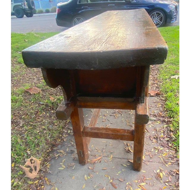 The warm tones of natural wood are the focus of this well-made Dongbei sideboard. Mortise and tenon construction. Crafted...
