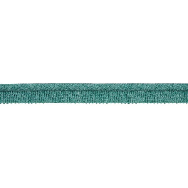 Available in a range of colors, this versatile linen-colored cord's attached lip can be easily sewn between layers of...