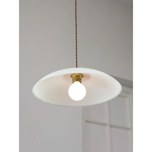 Total height of the lamp is adjustable, length of the cable alone is 140cm and can be shortened to your preference. Takes...