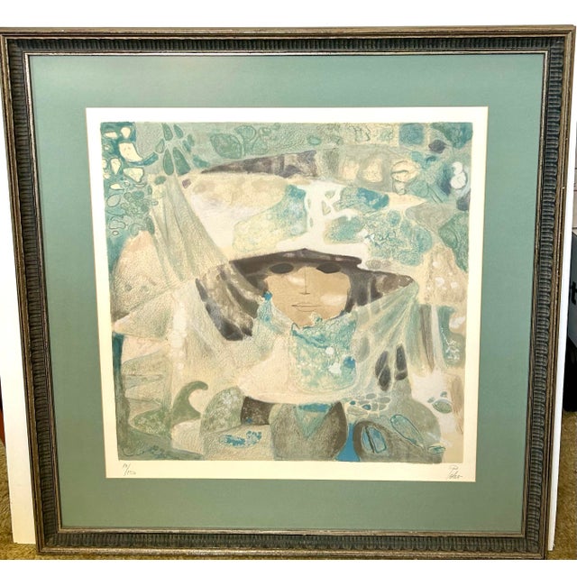 Framed color lithograph titled "Portrait of a Woman in a Headdress" by Venezuelan artist Hector Poleo (1918–1989). Limited...