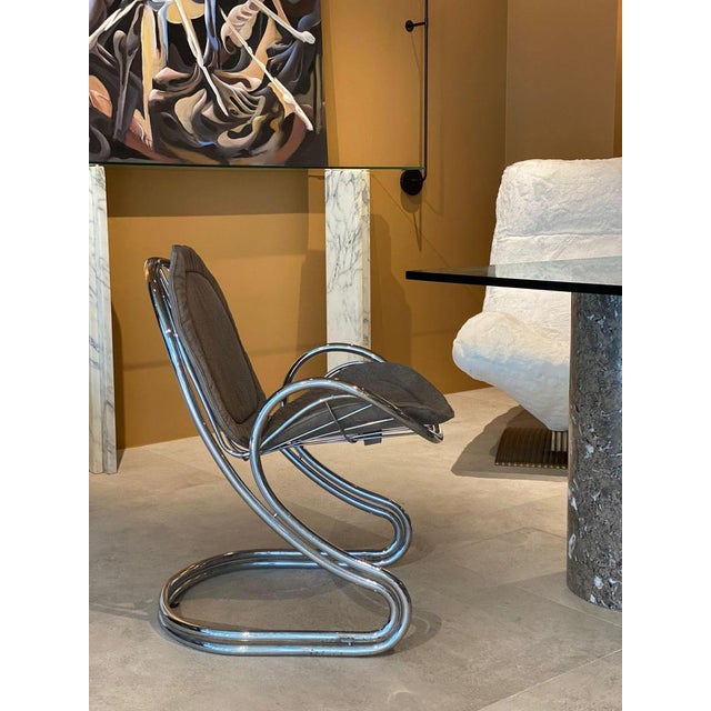 Full of character Gastone Rinaldi chair newly reupholstered in natural leather with slight texture. A statement piece for...