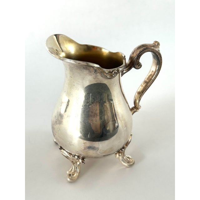 Webster Victorian or Rococo revival Silverplate small footed creamer.