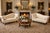 A pair of Biedermeier style chaise lounges upholstered in a cream patterned fabric featuring asymmetrical curved backs,...
