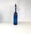 A Murano blown glass bottle with vertical canes, designed by Gio Ponti and produced by the historic Venini glassworks....