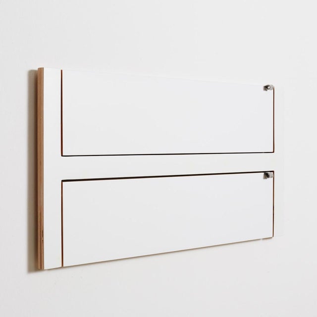 To eliminate mountains of shoes under the wardrobe, all fläpps wall shelves with a small depth can now be converted into a...