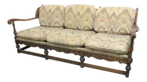 Early 20th Century Jacobean Carved Oak Wingback Sofa