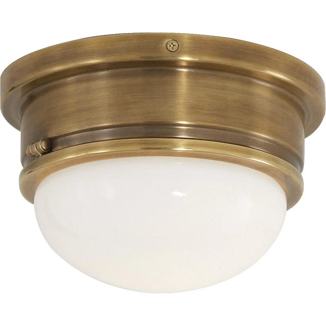Marine Medium Flush Mount in Hand-Rubbed Antique Brass with White Glass Designer: Chapman & Myers Mounting: Flush Shade...