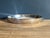 Oval silverplate vegetable dish with two cast handles. The body is plain. It was likely the base of a covered vegetable...