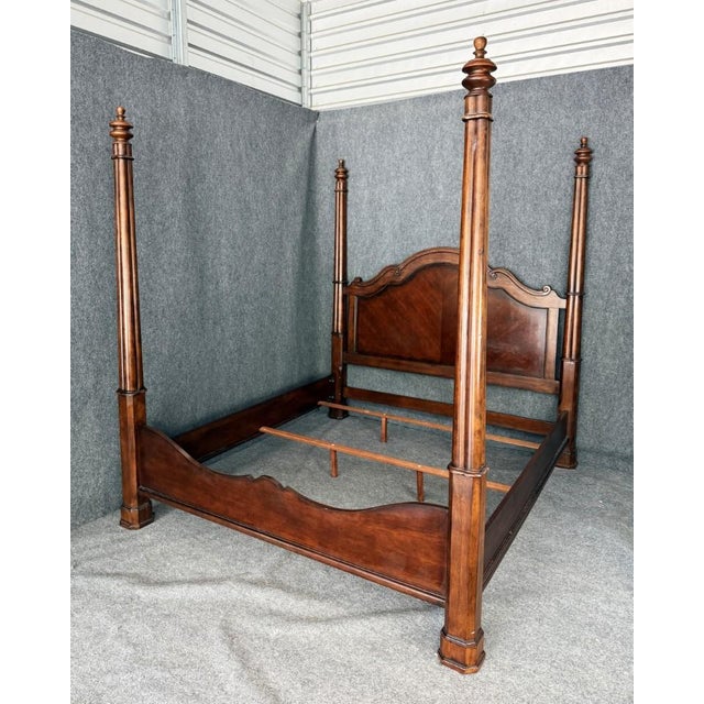 This Bassett Furniture king size bed frame features a stately traditional design with tall posts, a gracefully arched...